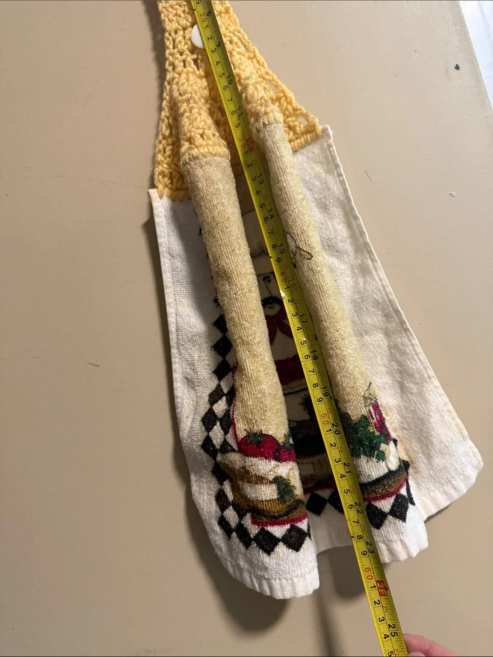 Vintage handmade yellow-topped crochet hanging kitchen towel featuring a chef